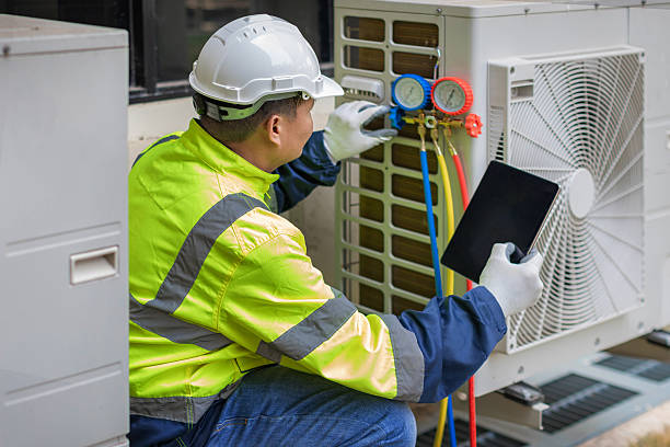 Professional Hvac technician working in Mendota, MN